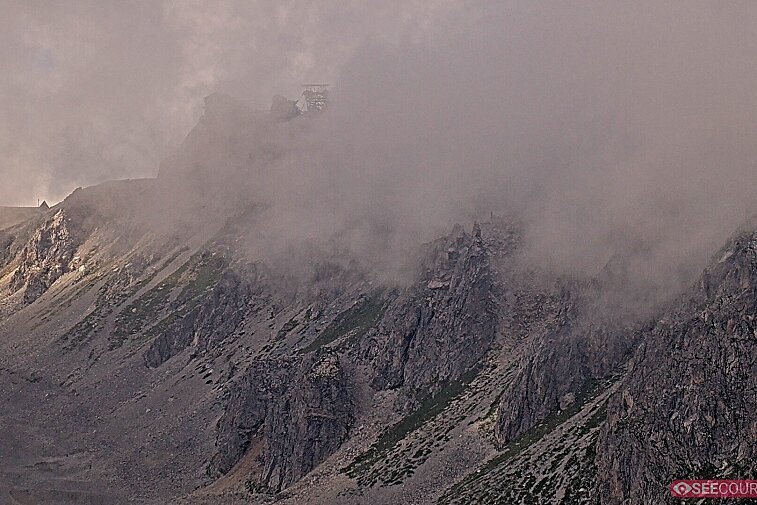 Totally awe-inspiring webcam view of La Saulire mountain, Courchevel, with the spiky rock formations of the peaks, the infamous couloirs on the right, and the main piste down to resort