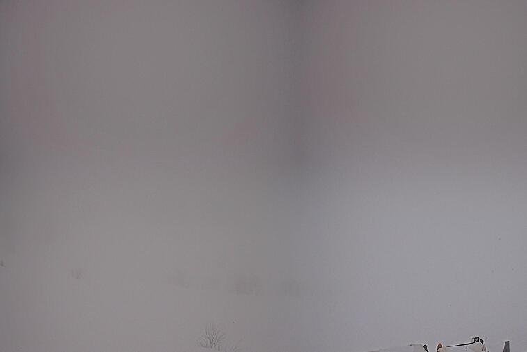 A screen shot of a snowy mountain with a time stamp at the bottom