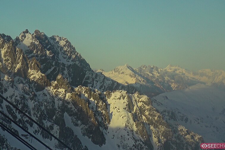 A computer screen shows a plain grey background