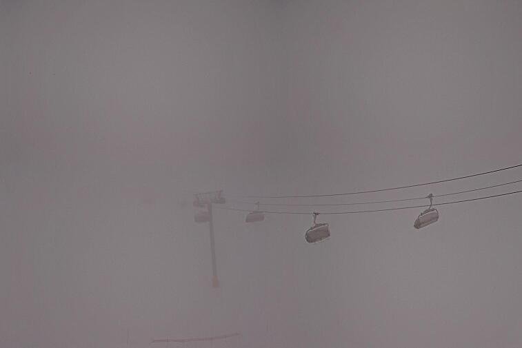 Webcam view of the whole of the Marmottes 2300m ski area and piste-front in the foreground, and the main gondola the Grand Rousses is on the far right along with La Folie Douce restaurant terrace