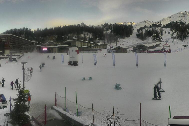 An aerial view of a snowy landscape with a time stamp of 00:23:05