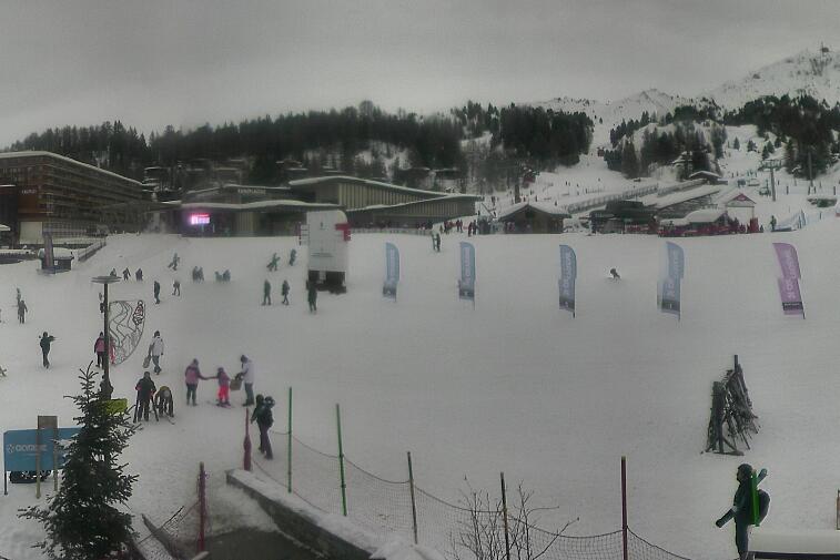 An aerial view of a snowy landscape with a time stamp of 00:23:05