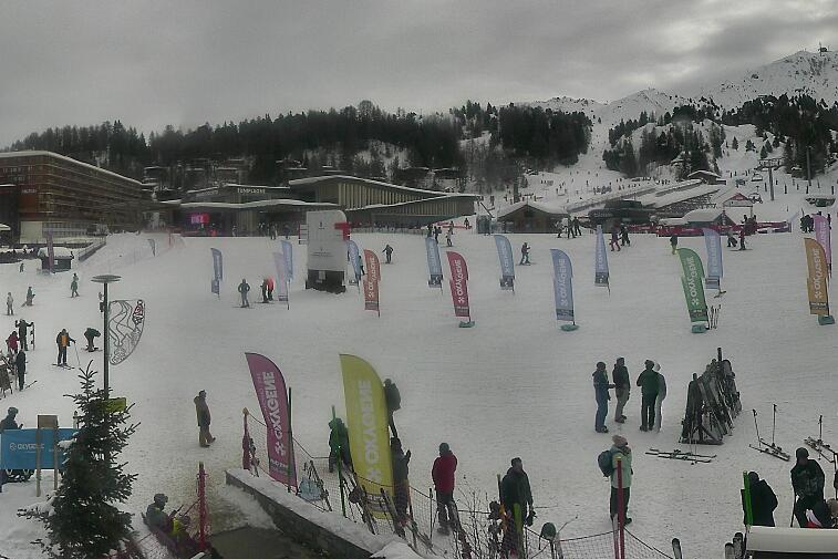 An aerial view of a snowy landscape with a time stamp of 00:23:05