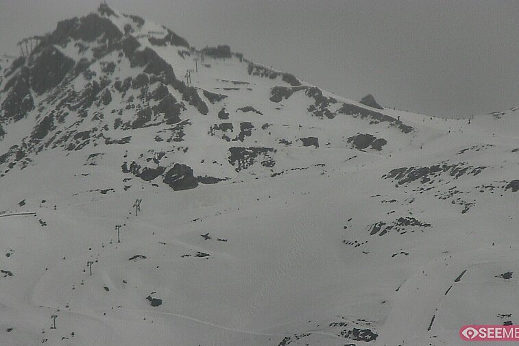 an image of mountains joining Meribel with Courchevel