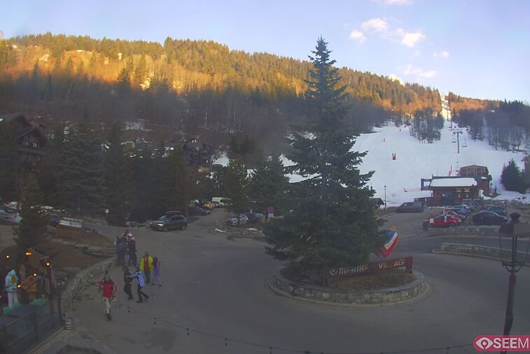 This webcam view from the entrance to Meribel Village looks out over the pistes coming down to the village