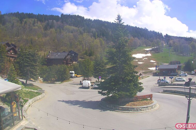 This webcam view from the entrance to Meribel Village looks out over the pistes coming down to the village