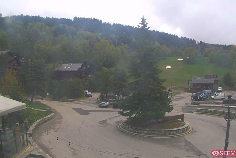 This webcam view from the entrance to Meribel Village looks out over the pistes coming down to the village