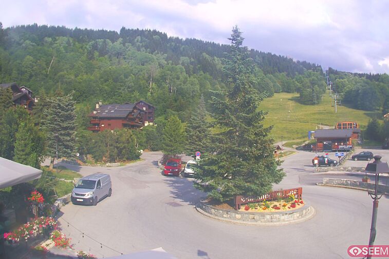 This webcam view from the entrance to Meribel Village looks out over the pistes coming down to the village