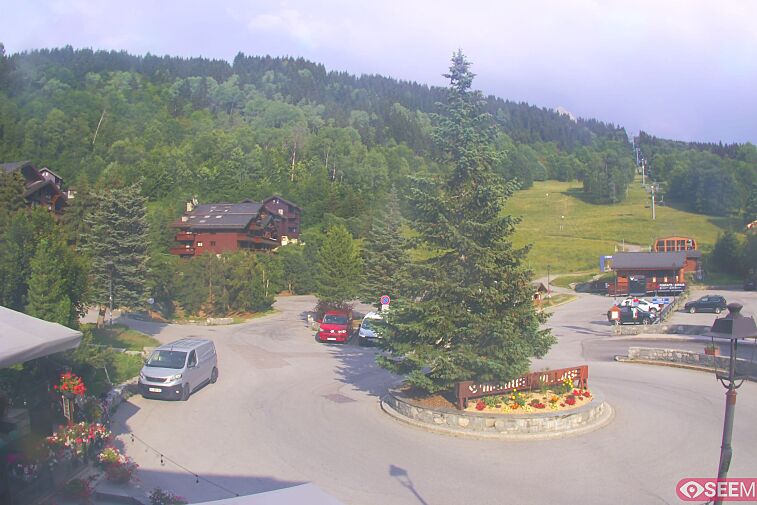 This webcam view from the entrance to Meribel Village looks out over the pistes coming down to the village