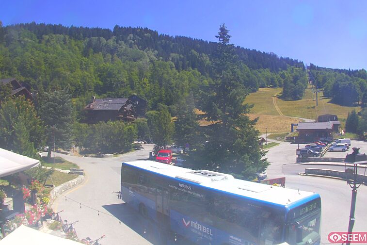This webcam view from the entrance to Meribel Village looks out over the pistes coming down to the village