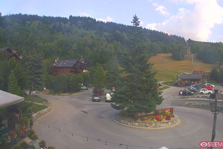 This webcam view from the entrance to Meribel Village looks out over the pistes coming down to the village
