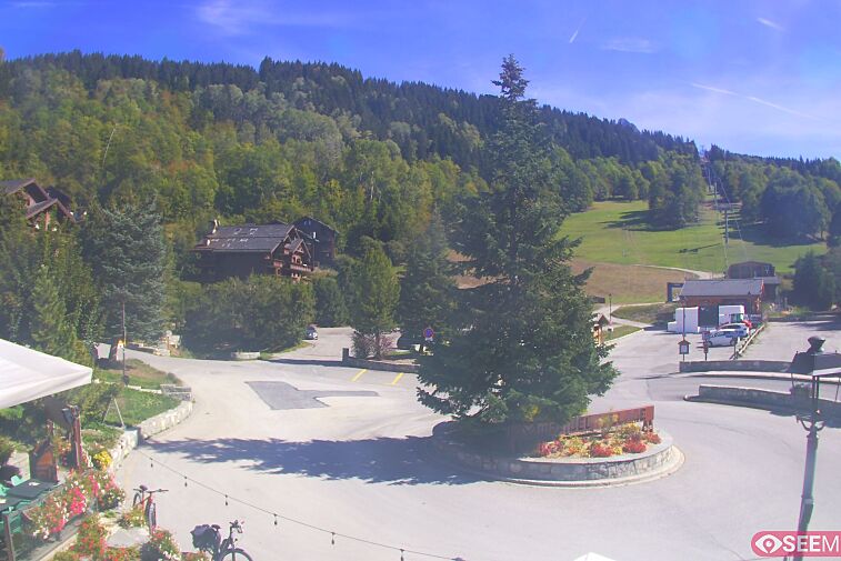 This webcam view from the entrance to Meribel Village looks out over the pistes coming down to the village