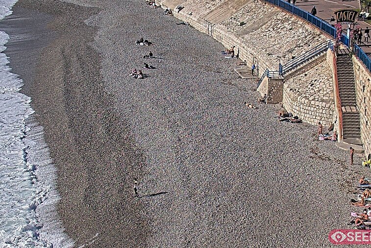 Webcam view of the Castel beach and club on the eastern-most side of the Promenade des Anglais and nestled under the Parc du Chateau, in Nice, France