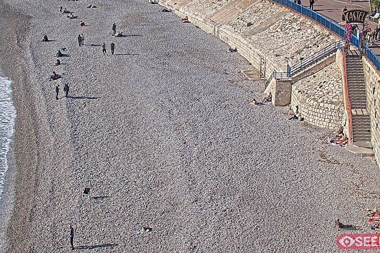 Webcam view of the Castel beach and club on the eastern-most side of the Promenade des Anglais and nestled under the Parc du Chateau, in Nice, France