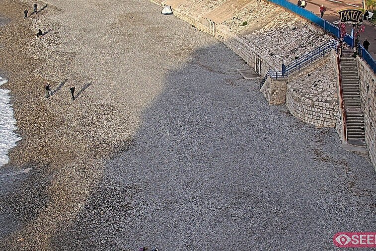 Webcam view of the Castel beach and club on the eastern-most side of the Promenade des Anglais and nestled under the Parc du Chateau, in Nice, France