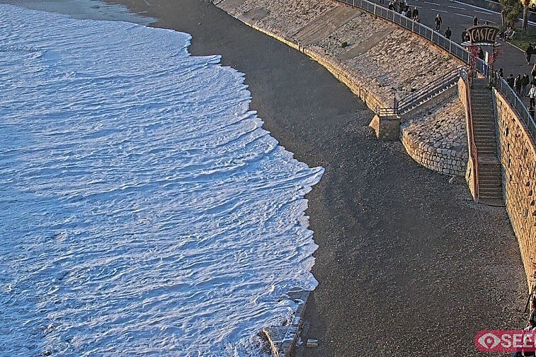 Webcam view of the Castel beach and club on the eastern-most side of the Promenade des Anglais and nestled under the Parc du Chateau, in Nice, France