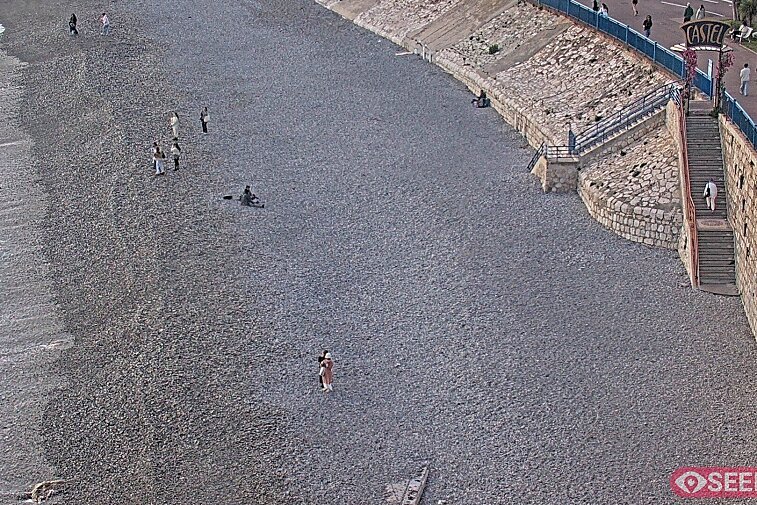 Webcam view of the Castel beach and club on the eastern-most side of the Promenade des Anglais and nestled under the Parc du Chateau, in Nice, France