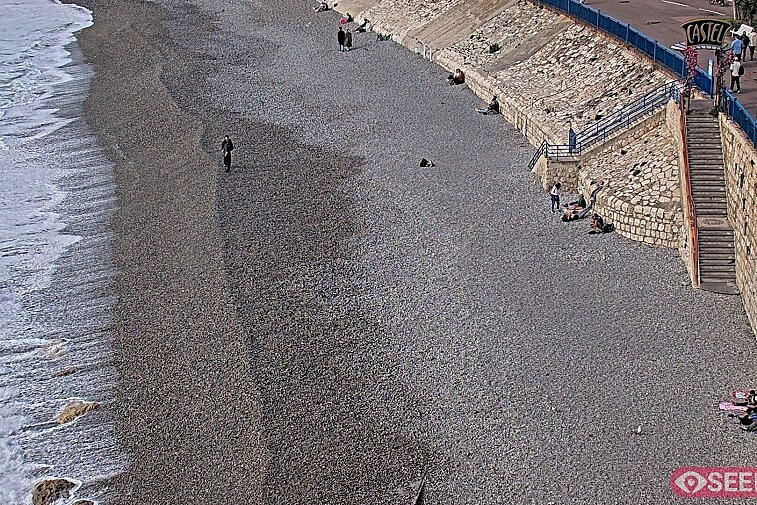 Webcam view of the Castel beach and club on the eastern-most side of the Promenade des Anglais and nestled under the Parc du Chateau, in Nice, France