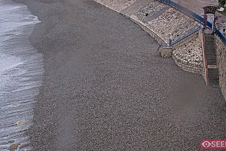 Webcam view of the Castel beach and club on the eastern-most side of the Promenade des Anglais and nestled under the Parc du Chateau, in Nice, France