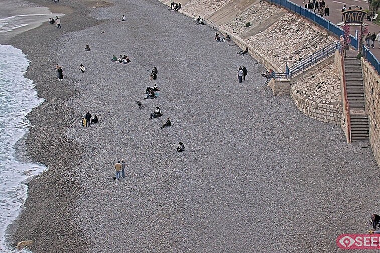Webcam view of the Castel beach and club on the eastern-most side of the Promenade des Anglais and nestled under the Parc du Chateau, in Nice, France