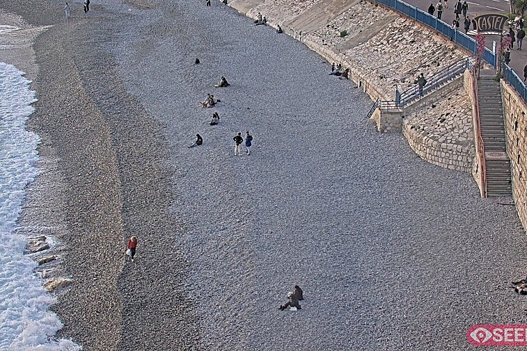 Webcam view of the Castel beach and club on the eastern-most side of the Promenade des Anglais and nestled under the Parc du Chateau, in Nice, France
