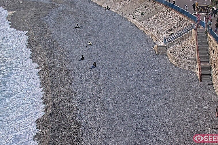 Webcam view of the Castel beach and club on the eastern-most side of the Promenade des Anglais and nestled under the Parc du Chateau, in Nice, France