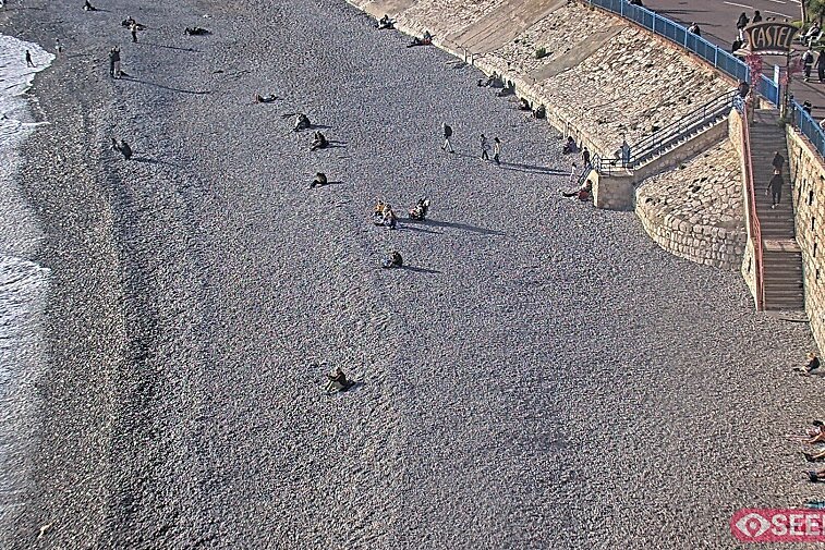 Webcam view of the Castel beach and club on the eastern-most side of the Promenade des Anglais and nestled under the Parc du Chateau, in Nice, France