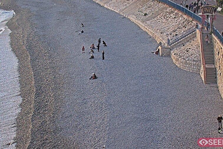Webcam view of the Castel beach and club on the eastern-most side of the Promenade des Anglais and nestled under the Parc du Chateau, in Nice, France