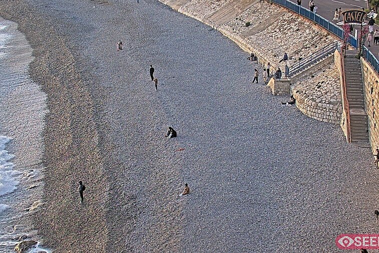 Webcam view of the Castel beach and club on the eastern-most side of the Promenade des Anglais and nestled under the Parc du Chateau, in Nice, France