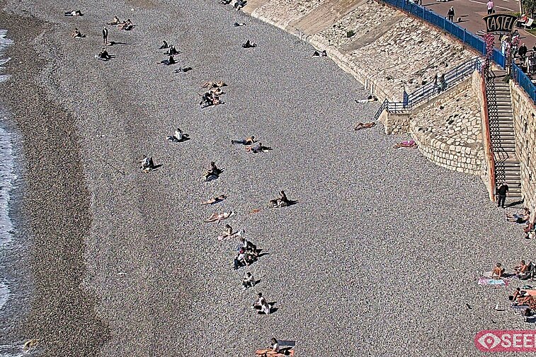 Webcam view of the Castel beach and club on the eastern-most side of the Promenade des Anglais and nestled under the Parc du Chateau, in Nice, France