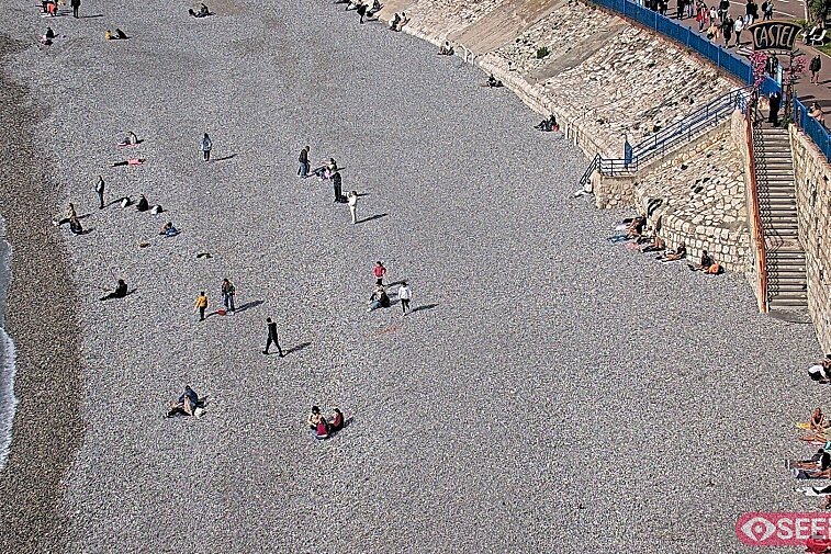 Webcam view of the Castel beach and club on the eastern-most side of the Promenade des Anglais and nestled under the Parc du Chateau, in Nice, France