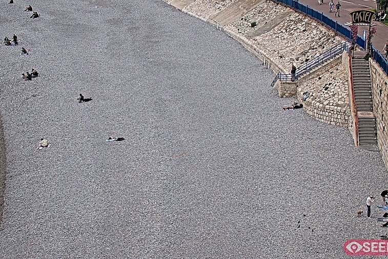 Webcam view of the Castel beach and club on the eastern-most side of the Promenade des Anglais and nestled under the Parc du Chateau, in Nice, France