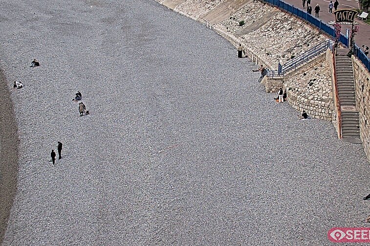 Webcam view of the Castel beach and club on the eastern-most side of the Promenade des Anglais and nestled under the Parc du Chateau, in Nice, France
