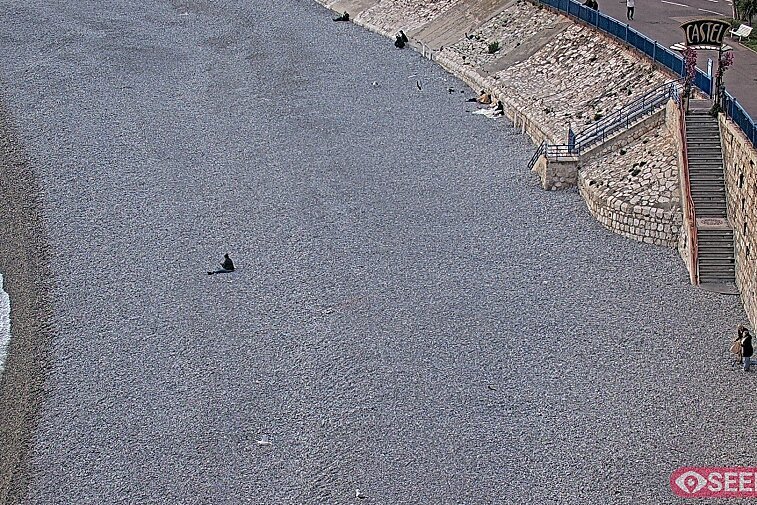 Webcam view of the Castel beach and club on the eastern-most side of the Promenade des Anglais and nestled under the Parc du Chateau, in Nice, France