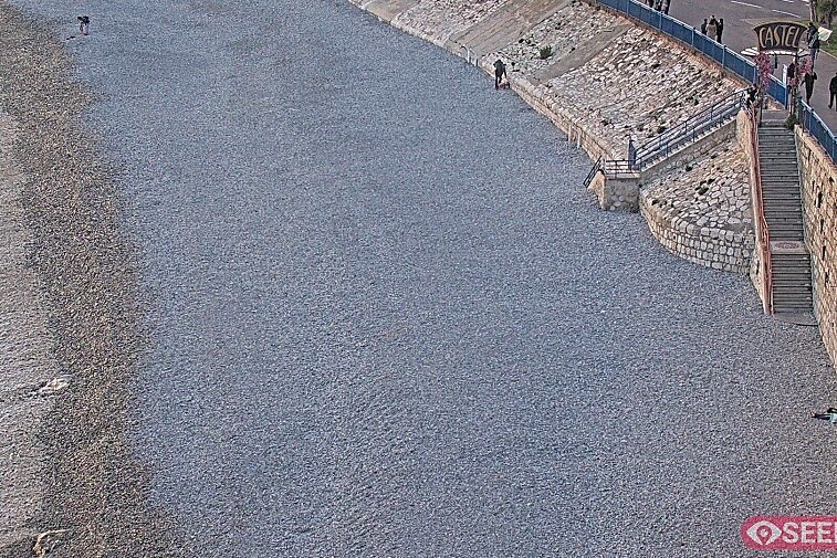 Webcam view of the Castel beach and club on the eastern-most side of the Promenade des Anglais and nestled under the Parc du Chateau, in Nice, France