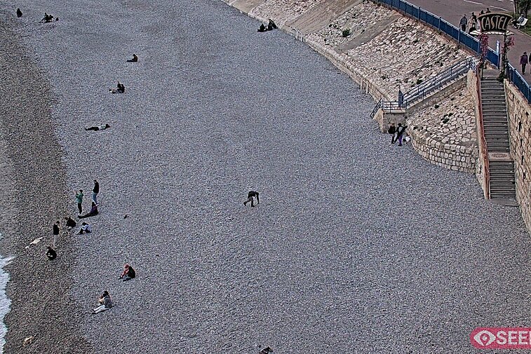 Webcam view of the Castel beach and club on the eastern-most side of the Promenade des Anglais and nestled under the Parc du Chateau, in Nice, France