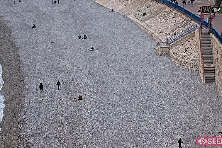 Webcam view of the Castel beach and club on the eastern-most side of the Promenade des Anglais and nestled under the Parc du Chateau, in Nice, France