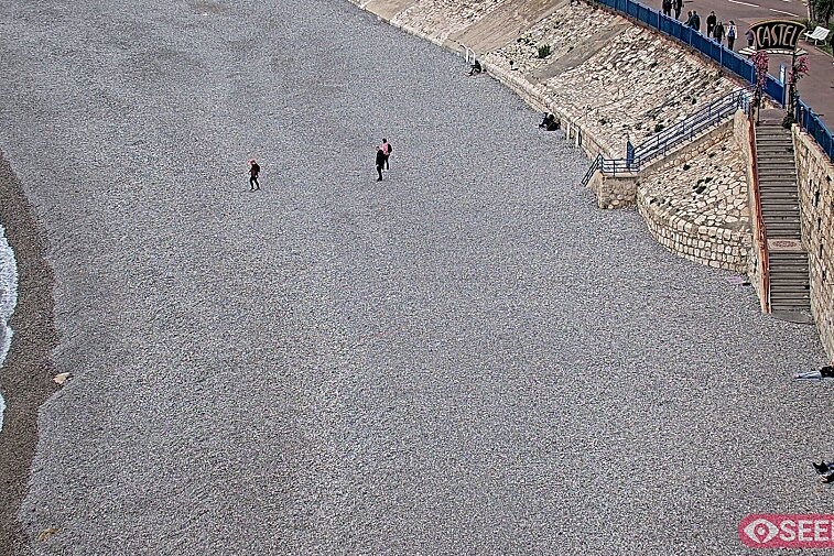 Webcam view of the Castel beach and club on the eastern-most side of the Promenade des Anglais and nestled under the Parc du Chateau, in Nice, France
