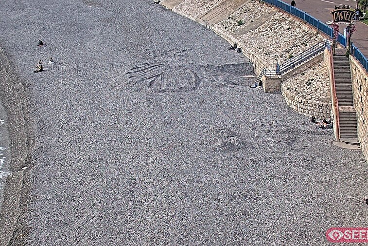 Webcam view of the Castel beach and club on the eastern-most side of the Promenade des Anglais and nestled under the Parc du Chateau, in Nice, France