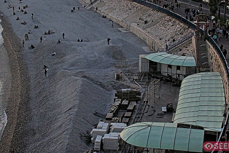 Webcam view of the Castel beach and club on the eastern-most side of the Promenade des Anglais and nestled under the Parc du Chateau, in Nice, France