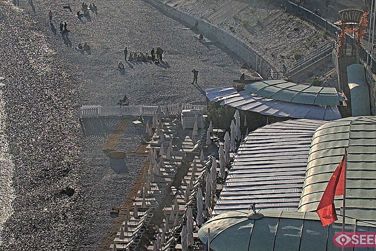 Webcam view of the Castel beach and club on the eastern-most side of the Promenade des Anglais and nestled under the Parc du Chateau, in Nice, France