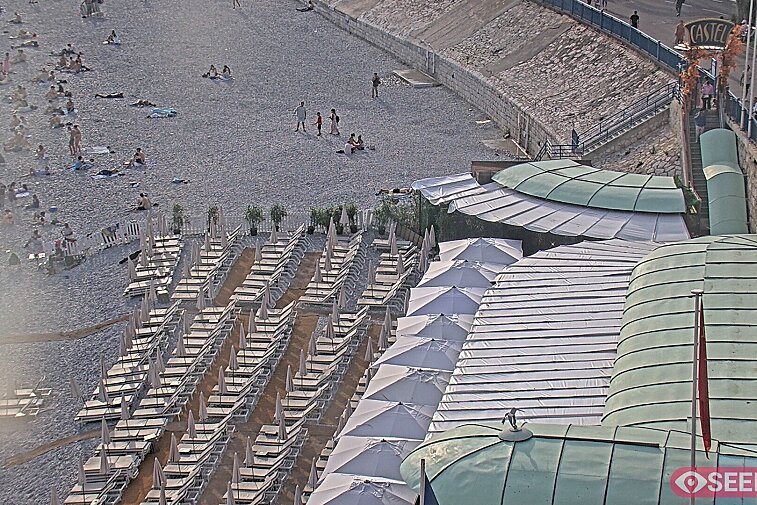 Webcam view of the Castel beach and club on the eastern-most side of the Promenade des Anglais and nestled under the Parc du Chateau, in Nice, France