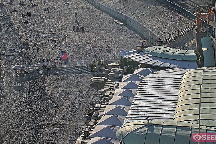 Webcam view of the Castel beach and club on the eastern-most side of the Promenade des Anglais and nestled under the Parc du Chateau, in Nice, France