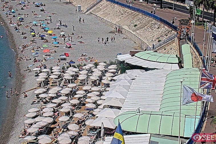 Webcam view of the Castel beach and club on the eastern-most side of the Promenade des Anglais and nestled under the Parc du Chateau, in Nice, France
