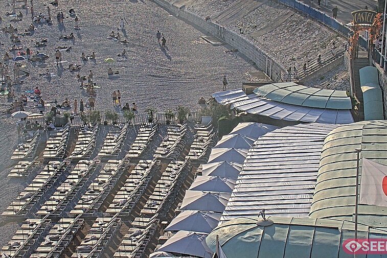 Webcam view of the Castel beach and club on the eastern-most side of the Promenade des Anglais and nestled under the Parc du Chateau, in Nice, France