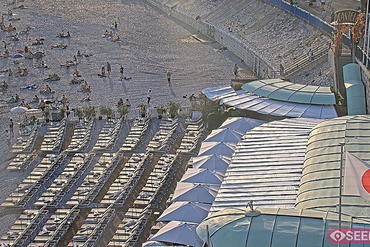 Webcam view of the Castel beach and club on the eastern-most side of the Promenade des Anglais and nestled under the Parc du Chateau, in Nice, France