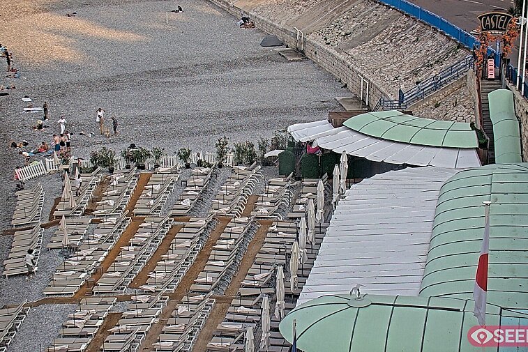 Webcam view of the Castel beach and club on the eastern-most side of the Promenade des Anglais and nestled under the Parc du Chateau, in Nice, France
