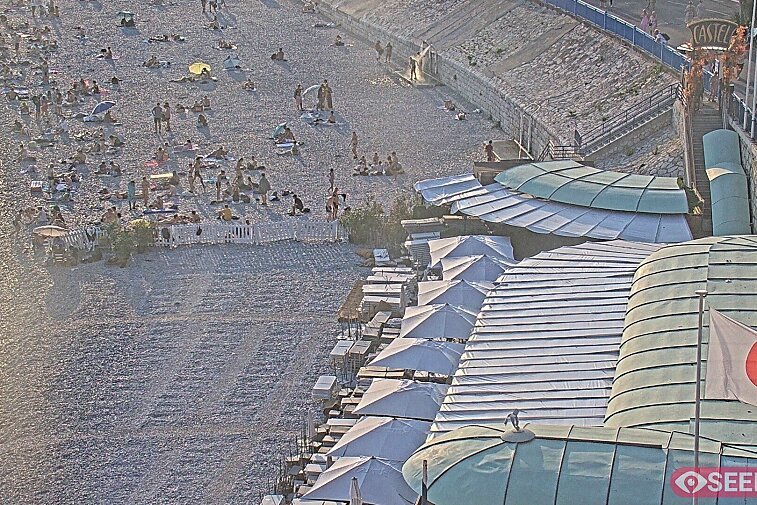 Webcam view of the Castel beach and club on the eastern-most side of the Promenade des Anglais and nestled under the Parc du Chateau, in Nice, France