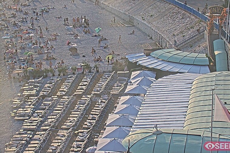 Webcam view of the Castel beach and club on the eastern-most side of the Promenade des Anglais and nestled under the Parc du Chateau, in Nice, France