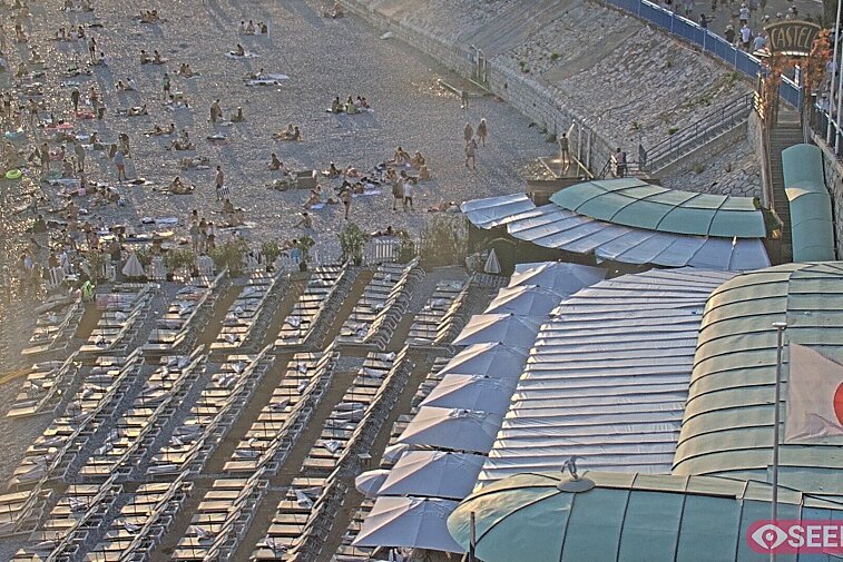 Webcam view of the Castel beach and club on the eastern-most side of the Promenade des Anglais and nestled under the Parc du Chateau, in Nice, France